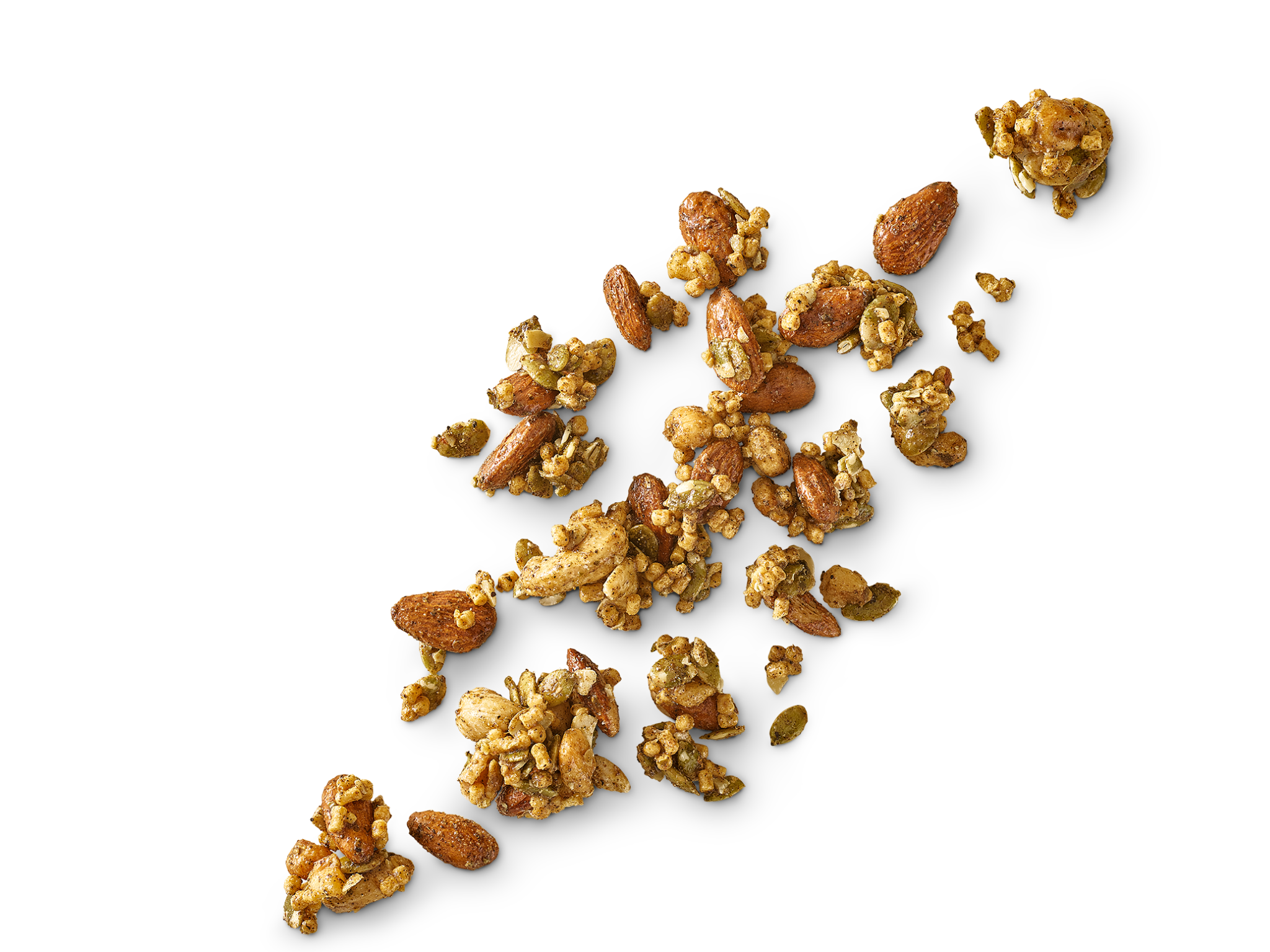 Close-up of Chili & Black Pepper Sprouted Snack Mix pieces scattered on a white background